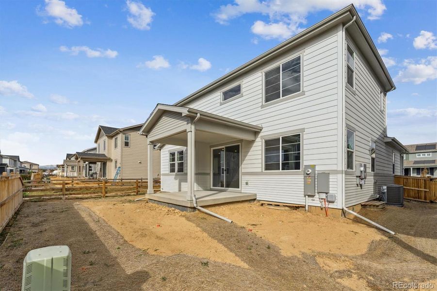 Exterior details and patio area of a home in Floret Collection at Parkdale Commons, Lafayette (Image 16).