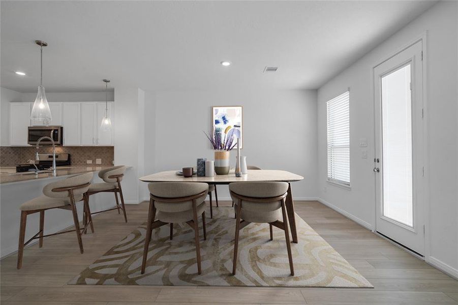 The open concept family, dining and kitchen makes for a great way to keep the party going and never miss a beat! Gather the family together in good conversation while preparing a fabulous meal in the breathtaking kitchen!