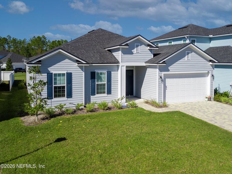 Front exterior of a new home in , St. Augustine, FL, highlighting curb appeal (Image 1). Front exterior of a new home in , St. Augustine, FL, highlighting curb appeal (Image 1).
