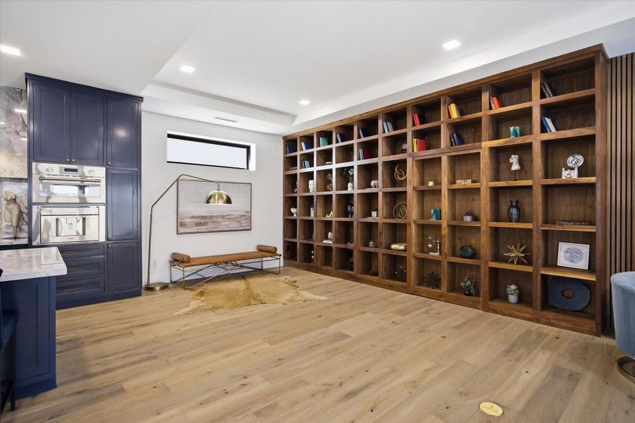 Custom built-ins add both dimension and functionality, creating a curated backdrop that enhances the home’s elevated aesthetic.