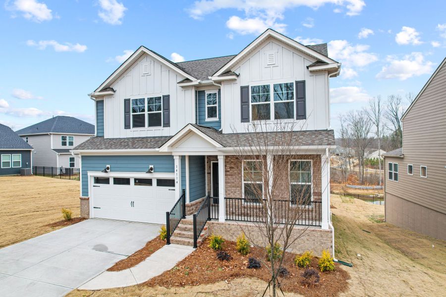 Front exterior of a new home in Bryton, Huntersville, NC, highlighting curb appeal (Image 28).