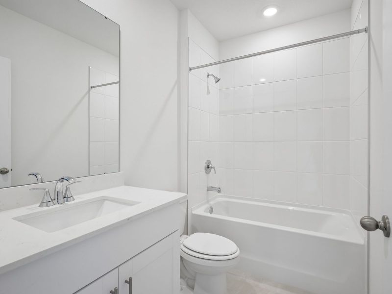 Furnished interior view inside a new home in The Reserve at Van Oaks, Auburndale (Image 9).