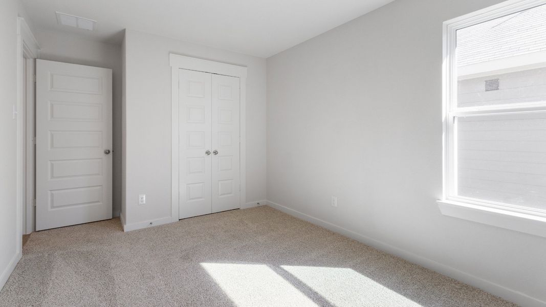 Representative furnished interior of a home built from the Blanton by Brightland Homes in Cielo, Conroe (Image 12).