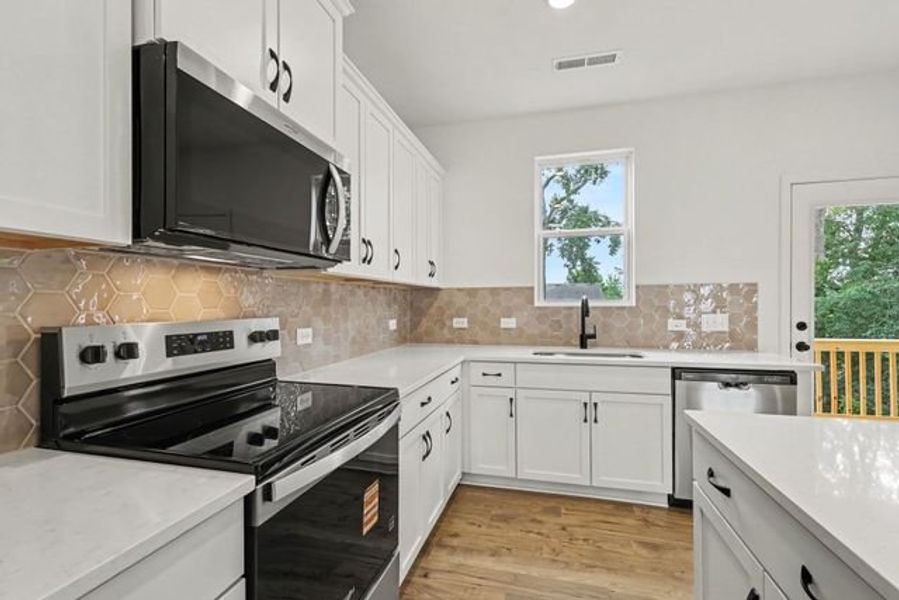 Representative furnished interior of a home built from the Darlow TH by True Homes in Penley Place Townhomes, Clover (Image 6). Representative furnished interior of a home built from the Darlow TH by True Homes in Penley Place Townhomes, Clover (Image 6).