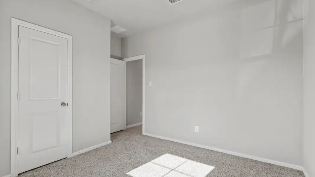 Representative unfurnished interior of a home built from the Midland by D.R. Horton in Audra Oaks, Denton (Image 30).