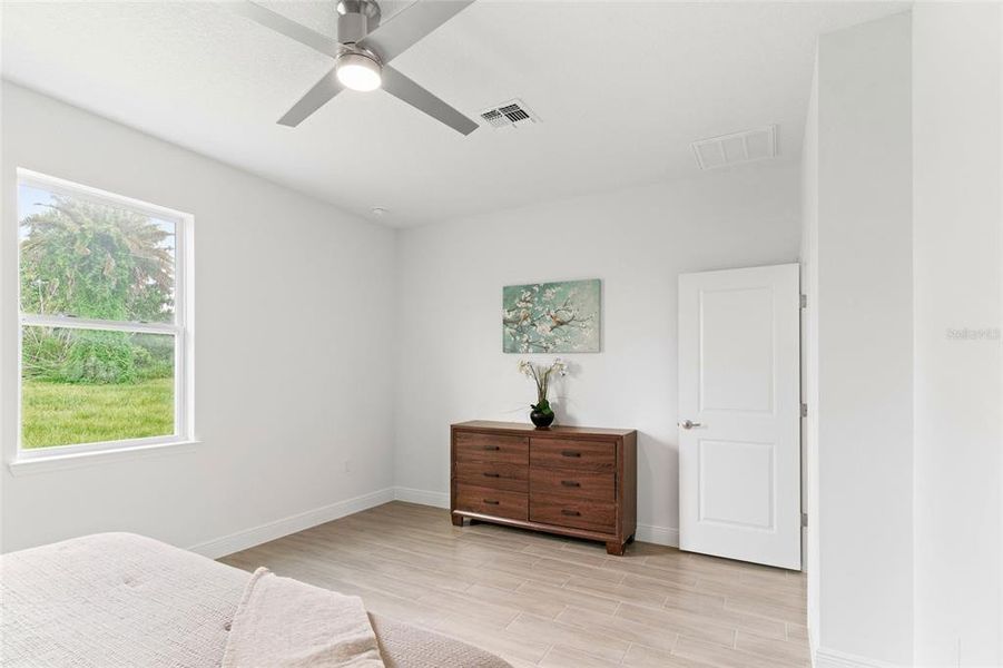 Furnished interior view inside a new home in , Kissimmee (Image 9).
