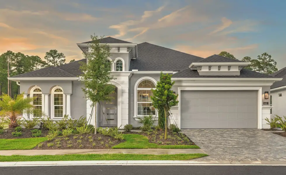 Front exterior of a new home in Westlake Single Family, Ormond Beach, FL, highlighting curb appeal (Image 1).