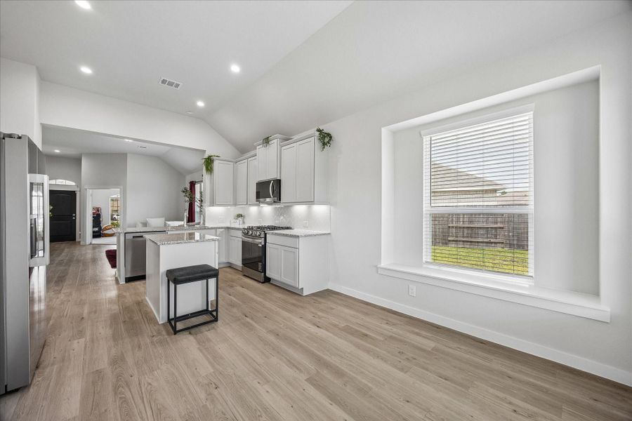 Furnished interior view inside a new home in Sierra Vista, Iowa Colony (Image 8).
