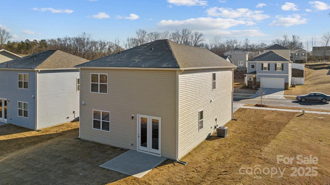 Front exterior of a new home in , Charlotte, NC, highlighting curb appeal (Image 14).