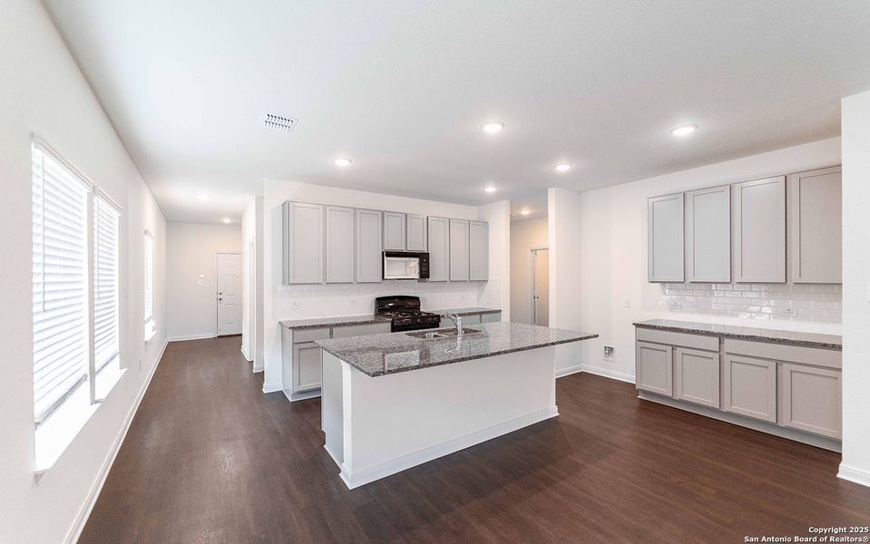 Furnished interior view inside a new home in Hickory Ridge, Elmendorf (Image 5).