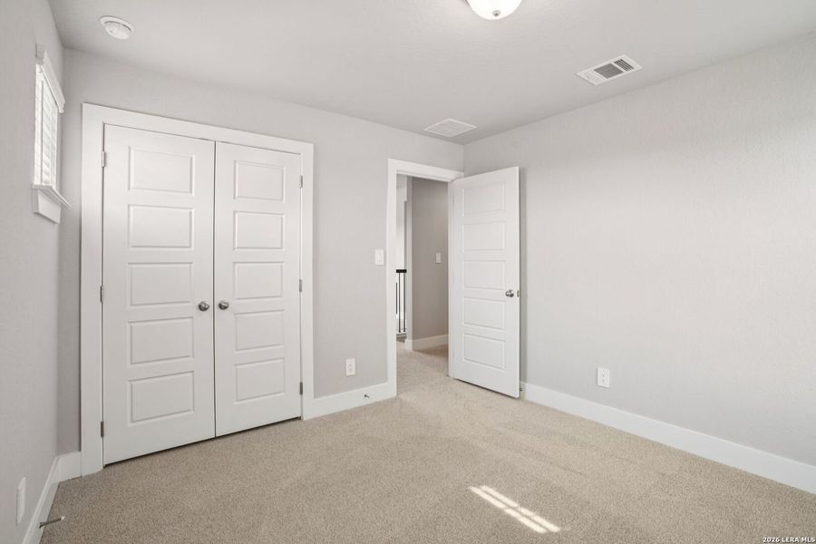 Spacious, unfurnished interior of a new home in Legendary Trails - Premier Series, Cibolo (Image 31).