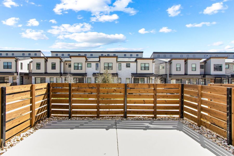 Exterior details and patio area of a home in Willow Grove Townhomes, Melissa (Image 26). Exterior details and patio area of a home in Willow Grove Townhomes, Melissa (Image 26).