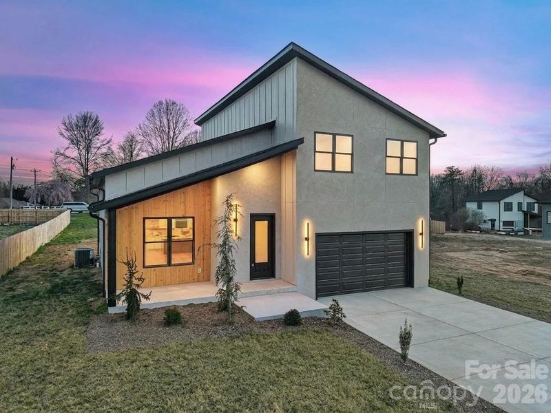 Front exterior of a new home in , Flat Rock, NC, highlighting curb appeal (Image 2). Front exterior of a new home in , Flat Rock, NC, highlighting curb appeal (Image 2).