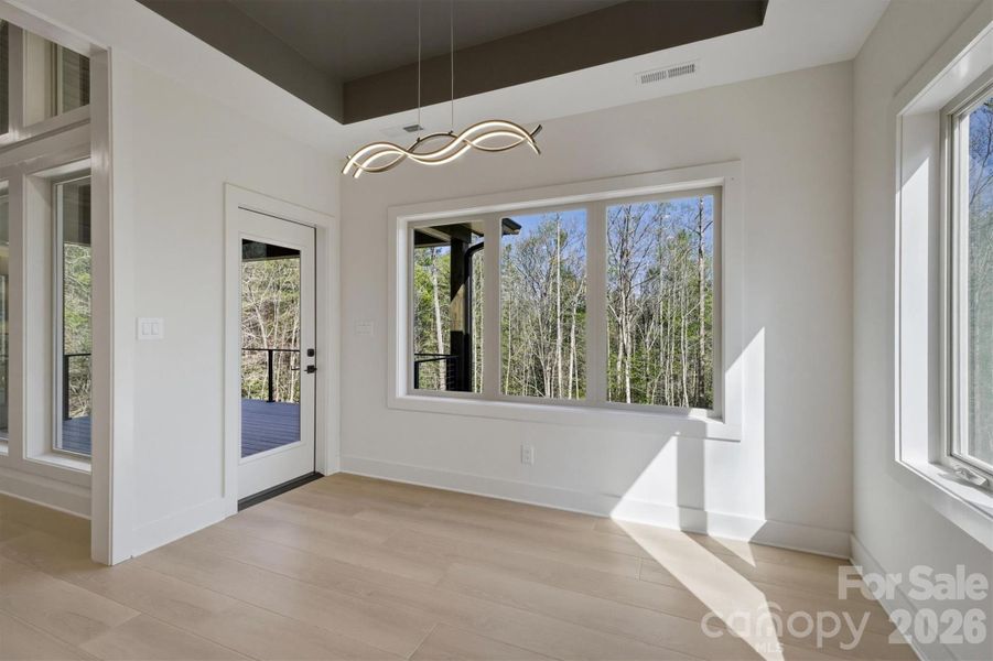 We will now check out the back deck by passing through this door in the dining room. Do not miss the dining room chandalier on the way outside. We will now check out the back deck by passing through this door in the dining room. Do not miss the dining room chandalier on the way outside.