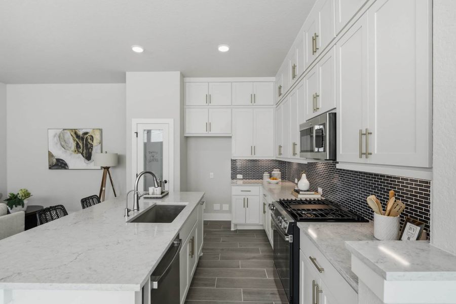 Furnished interior view inside a new home in Prominence – Now Selling, San Antonio (Image 10).