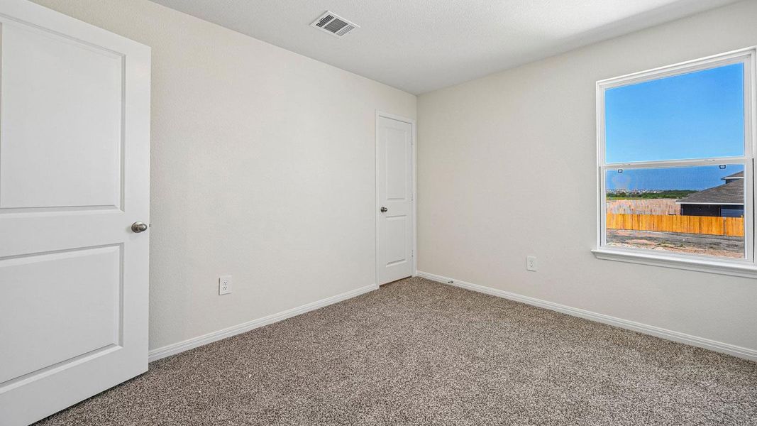 Spacious, unfurnished interior of a new home in Carillon, Manor (Image 26).