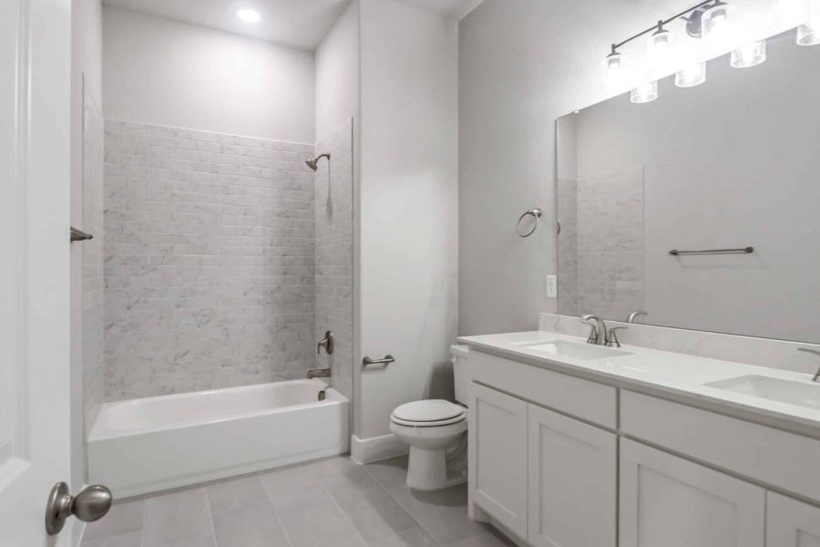 Representative furnished interior of a home built from the The Teton by Lillian Custom Homes in Polo Ridge, Heath (Image 12).