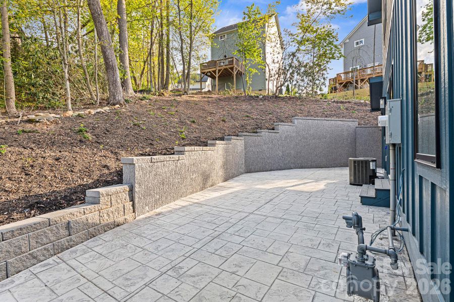 Exterior details and patio area of a home in , Arden (Image 38).