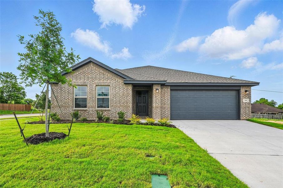 Front exterior of a new home in Trail Creek, Cleburne, TX, highlighting curb appeal (Image 2). Front exterior of a new home in Trail Creek, Cleburne, TX, highlighting curb appeal (Image 2).