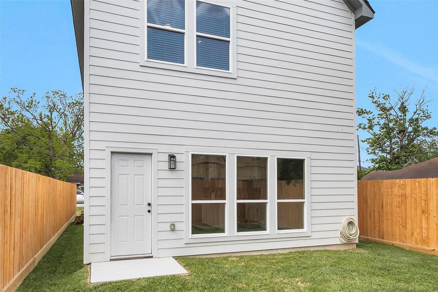 Exterior details and patio area of a home in , Houston (Image 25).