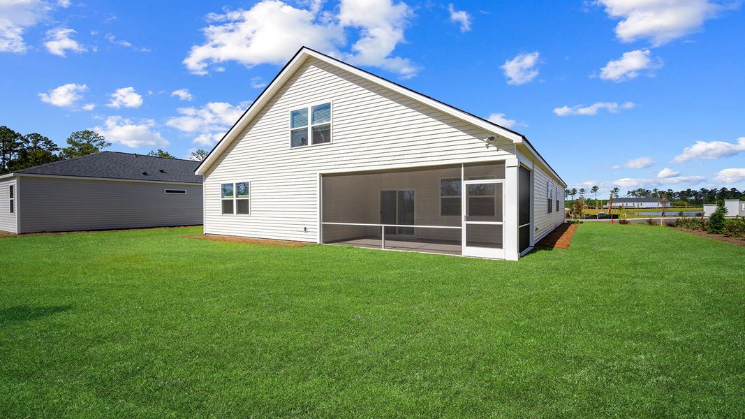 Exterior details and patio area of a home in The Lakes at North Glynn, Brunswick (Image 23).