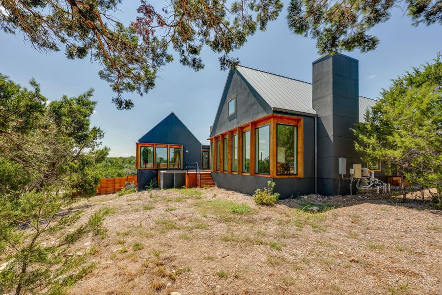Front exterior of a new home in , Austin, TX, highlighting curb appeal (Image 24). Front exterior of a new home in , Austin, TX, highlighting curb appeal (Image 24).