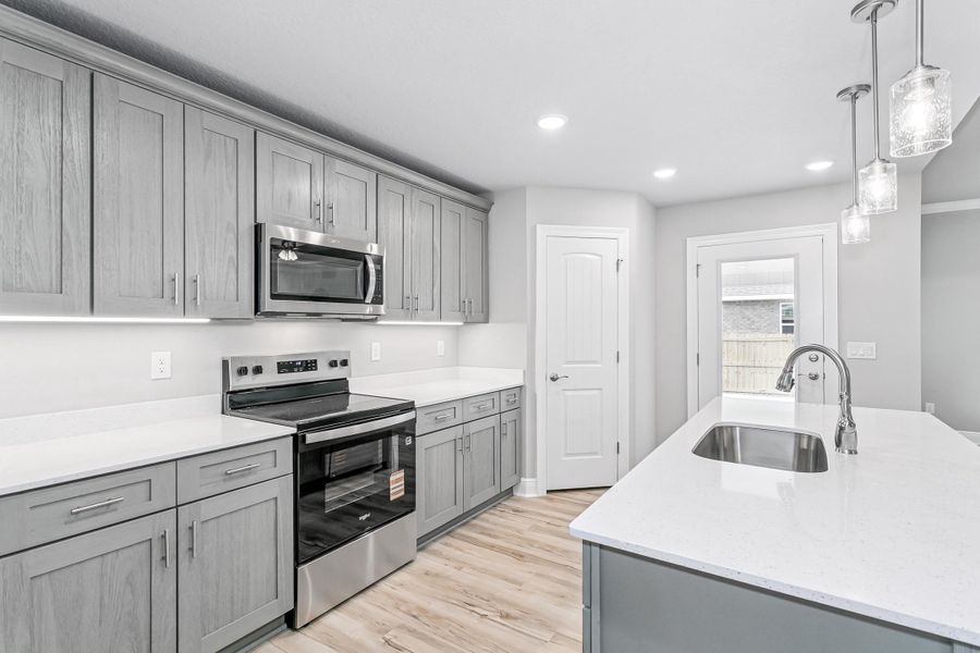 Representative furnished interior of a home built from the The Liberty by Herbst Homes in Clear Water Landing, Milton (Image 47).