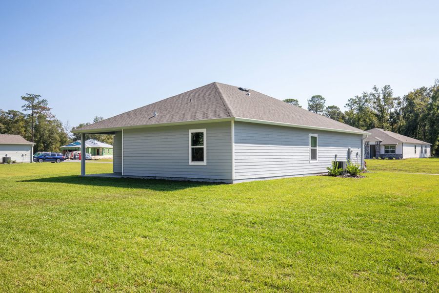 Exterior details and patio area of a home in Heritage Station, Punta Gorda (Image 9).