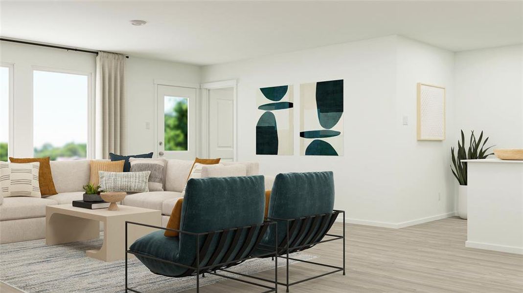 Living area featuring light wood finished floors and baseboards