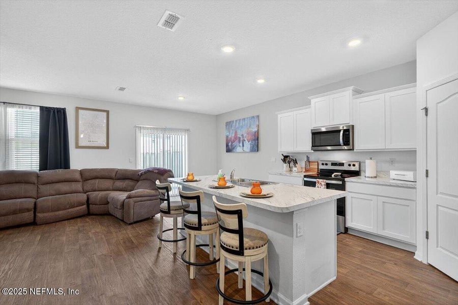 Furnished interior view inside a new home in River Glen Express, Yulee (Image 14).