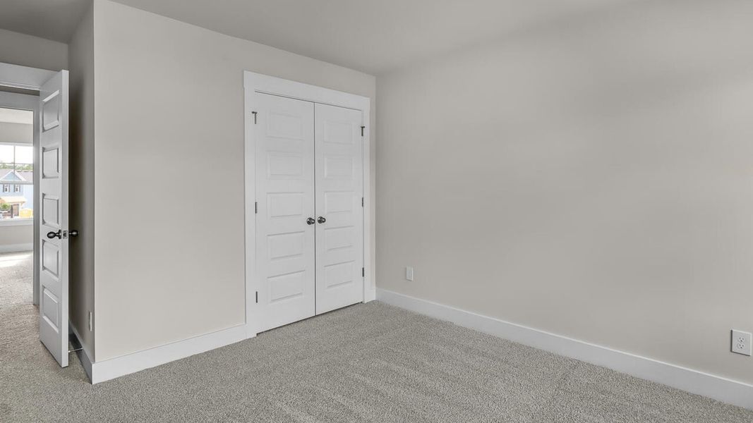 Spacious, unfurnished interior of a new home in Indigo Preserve, Leland (Image 31).