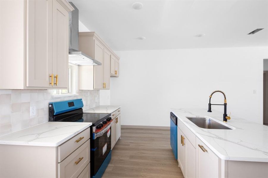 Kitchen with dishwasher, electric stove, a sink, wall chimney exhaust hood, and tasteful backsplash Kitchen with dishwasher, electric stove, a sink, wall chimney exhaust hood, and tasteful backsplash