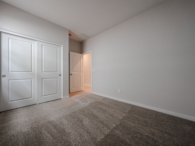 A room with white doors.