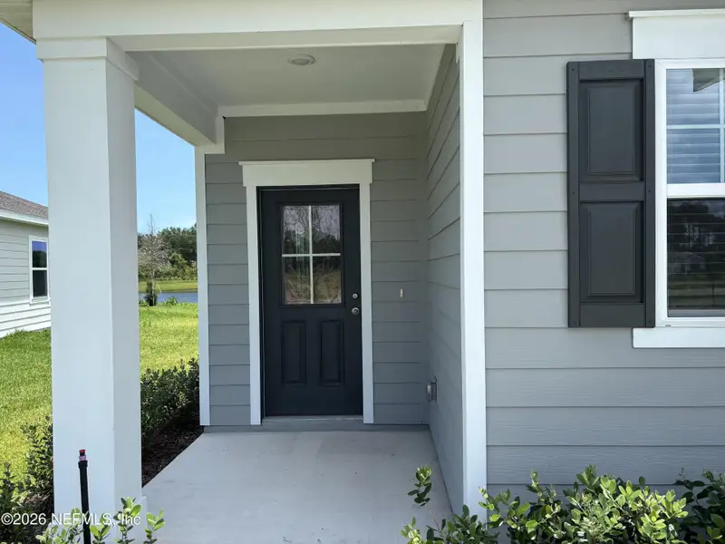 Exterior details and patio area of a home in , Palm Coast (Image 2). Exterior details and patio area of a home in , Palm Coast (Image 2).