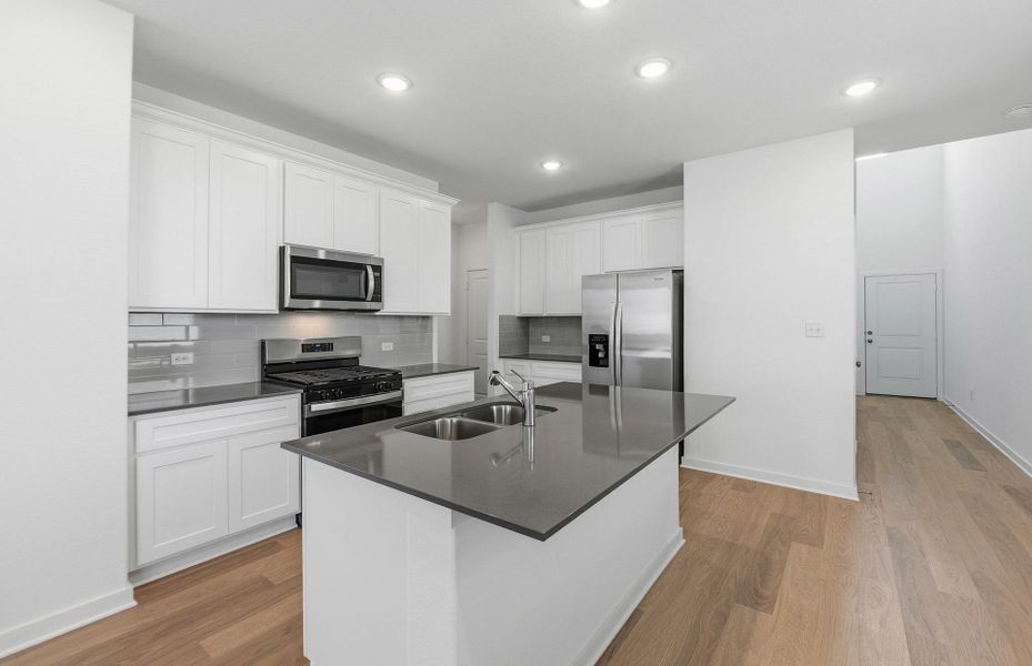 Furnished interior view inside a new home in Sunfield, Buda (Image 11).