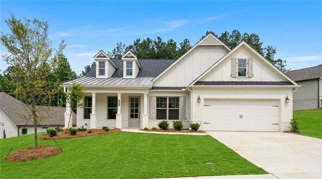 Front exterior of a new home in , Canton, GA, highlighting curb appeal (Image 1). Front exterior of a new home in , Canton, GA, highlighting curb appeal (Image 1).