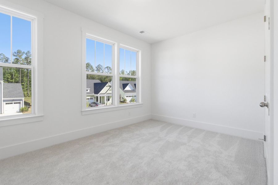 Spacious, unfurnished interior of a new home in Homecoming, Ravenel (Image 29). Spacious, unfurnished interior of a new home in Homecoming, Ravenel (Image 29).