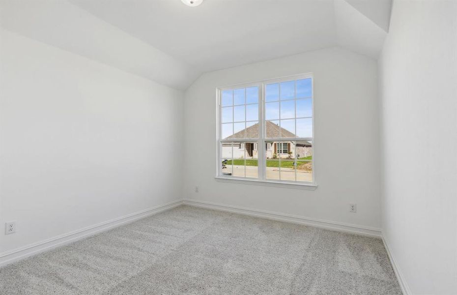 Secondary bedroom with ample closet space *real home pictured