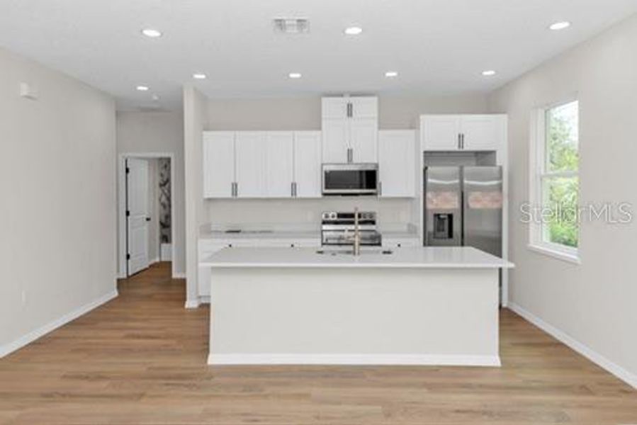 Furnished interior view inside a new home in , Deltona (Image 6).