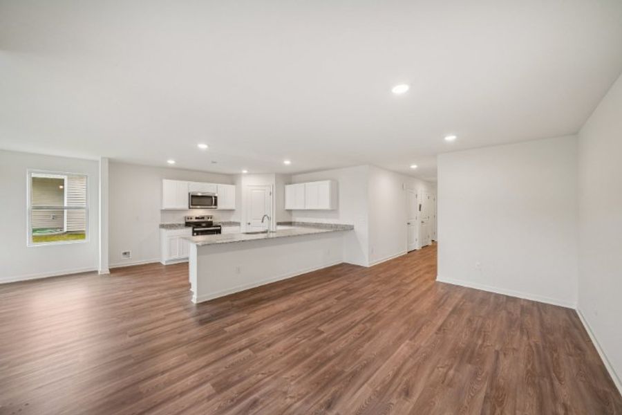 A large empty kitchen. A large empty kitchen.