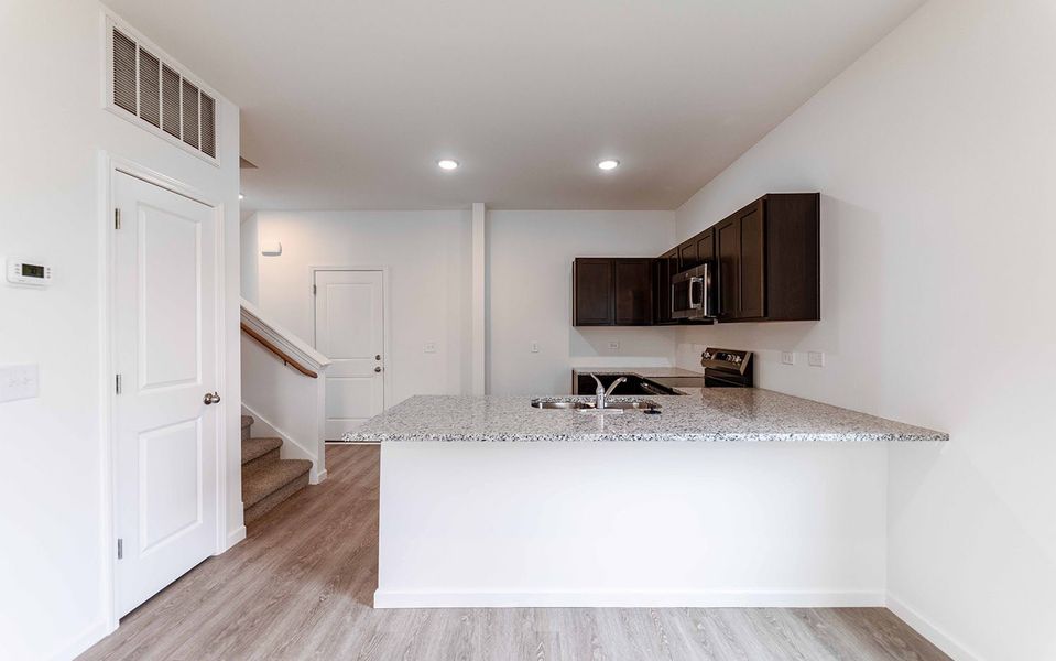 Furnished interior view inside a new home in Stonehenge, Manchester (Image 4).