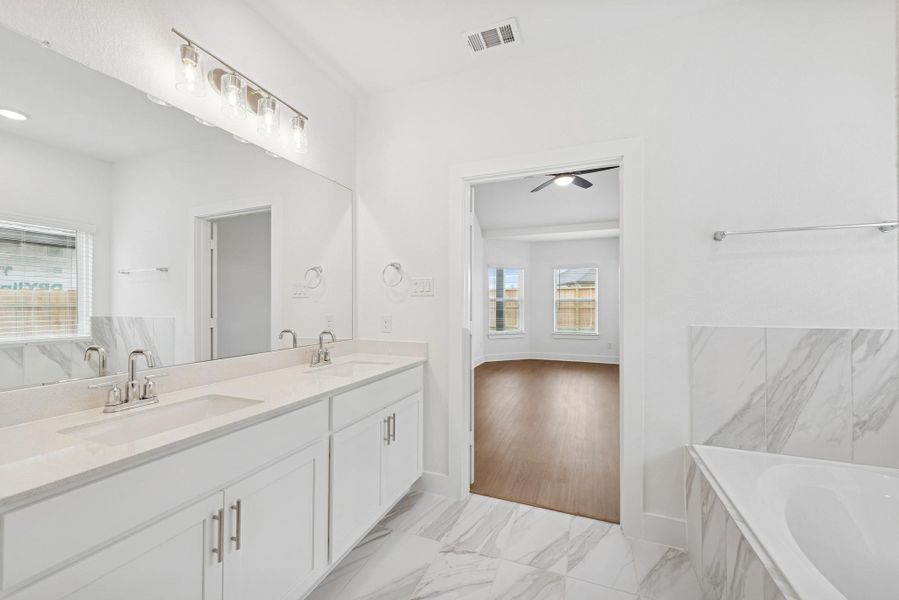 Furnished interior view inside a new home in Marvida, Cypress (Image 7).