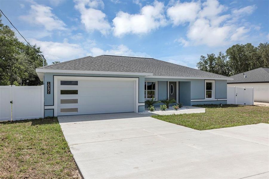 Front exterior of a new home in , Dunnellon, FL, highlighting curb appeal (Image 2). Front exterior of a new home in , Dunnellon, FL, highlighting curb appeal (Image 2).