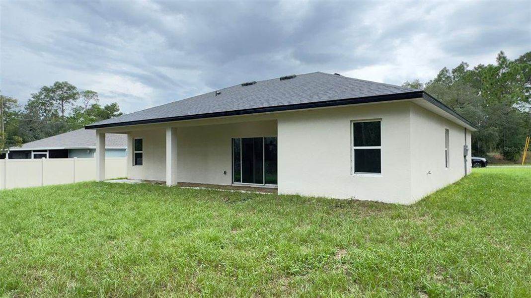 Front exterior of a new home in , Citrus Springs, FL, highlighting curb appeal (Image 15).