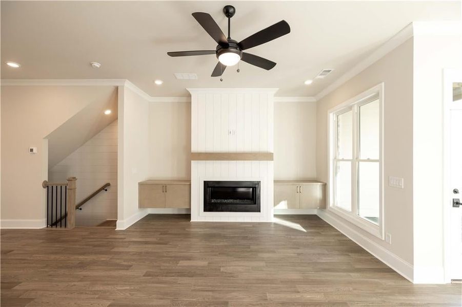 One example of how your family room set up can be designed- linear fireplace is already included in listed price - you can still add the type of surround and cabinetry you want to add. *Image is of previously built home* One example of how your family room set up can be designed- linear fireplace is already included in listed price - you can still add the type of surround and cabinetry you want to add. *Image is of previously built home*