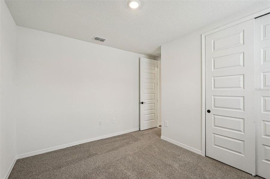 Spacious, unfurnished interior of a new home in Oakfield Trails - Signature Series, Parrish (Image 34).