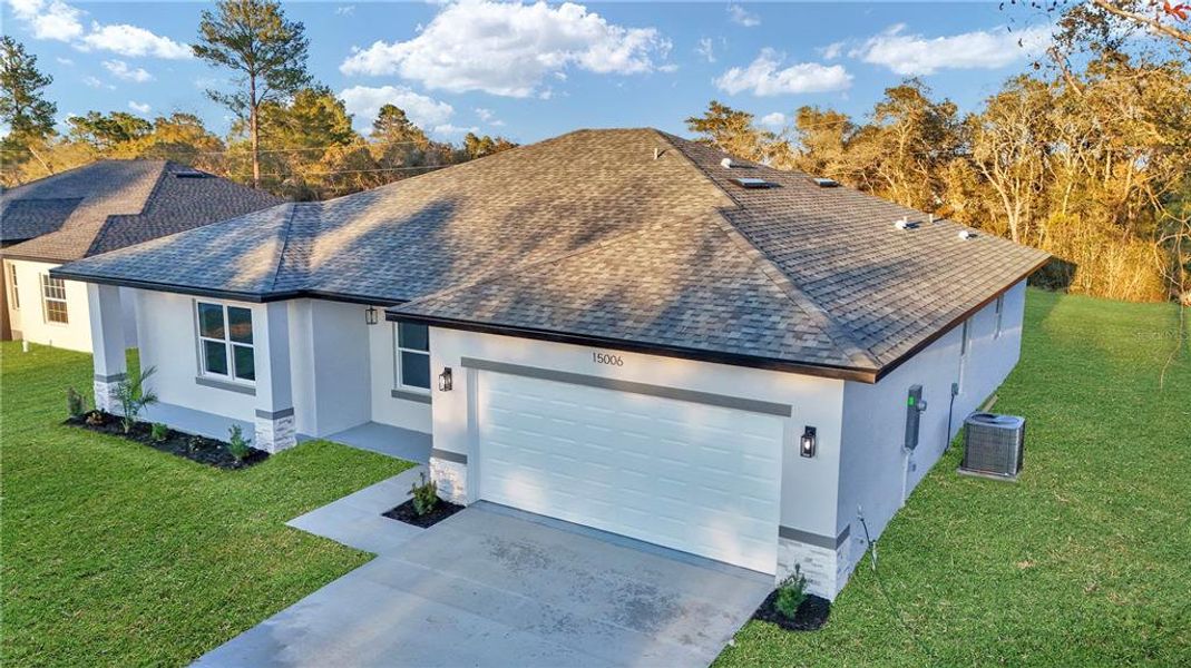 Front exterior of a new home in , Ocala, FL, highlighting curb appeal (Image 25). Front exterior of a new home in , Ocala, FL, highlighting curb appeal (Image 25).