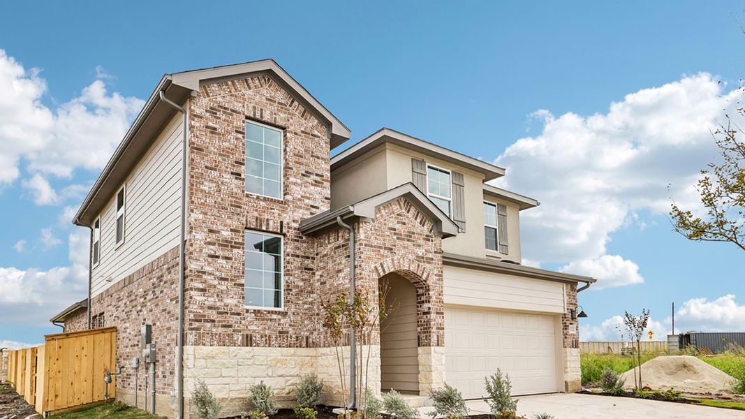 Front exterior of a new home in Briarwood, Elgin, TX, highlighting curb appeal (Image 18).
