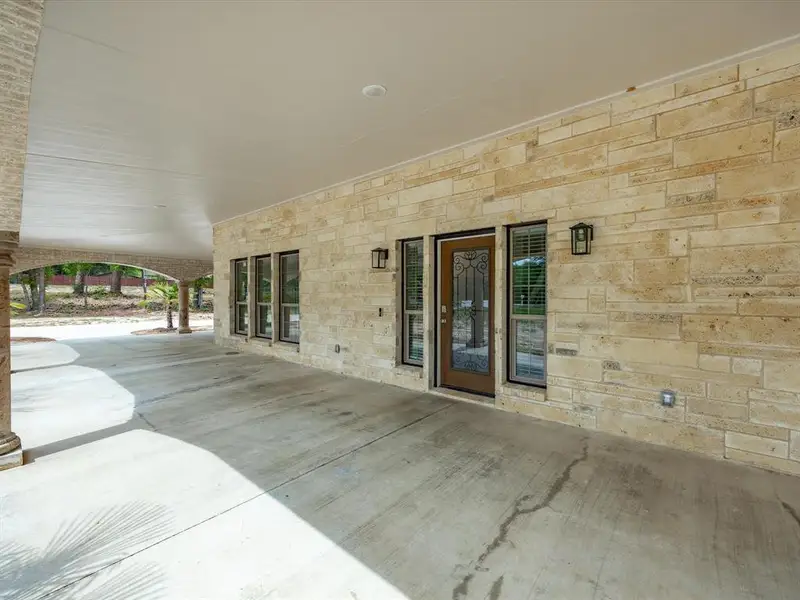 Exterior details and patio area of a home in , Edgewood (Image 3).