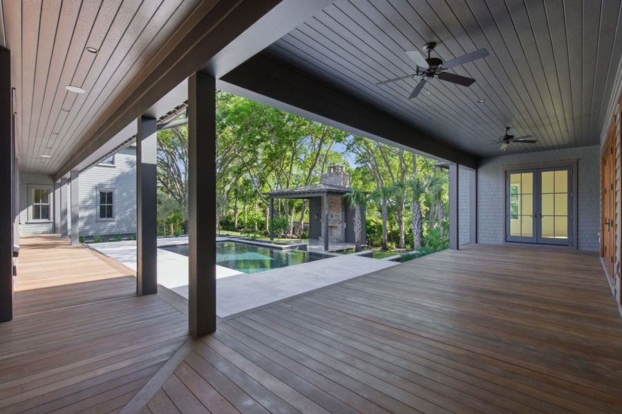 Exterior details and patio area of a home in , Sullivan's Island (Image 21).